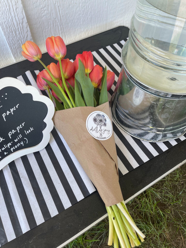 Bouquet of tulips on the table at a roadside flower stand