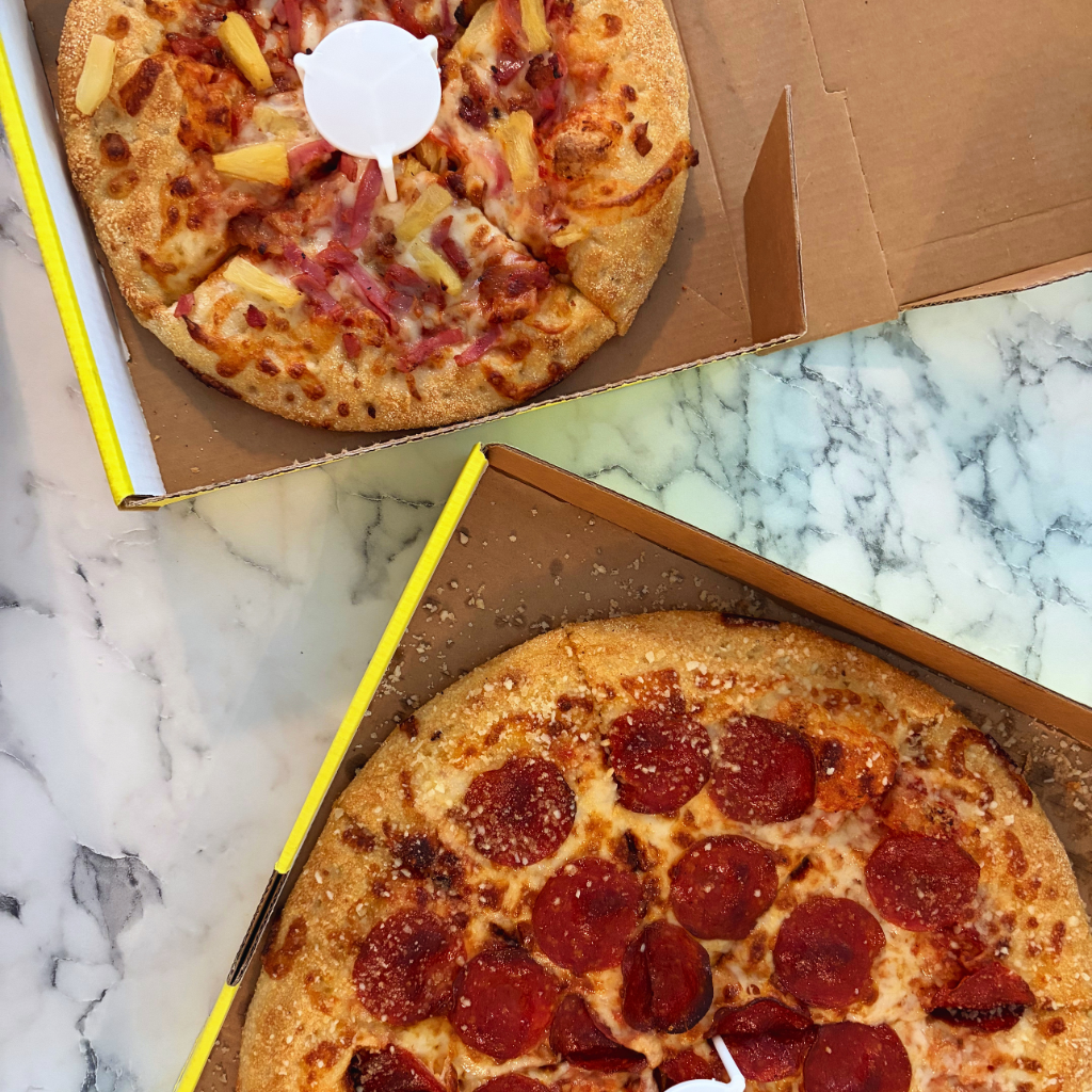 Two boxes of pizza